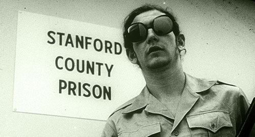 Philip Zimbardo, with slide of Angel & Devil experiment